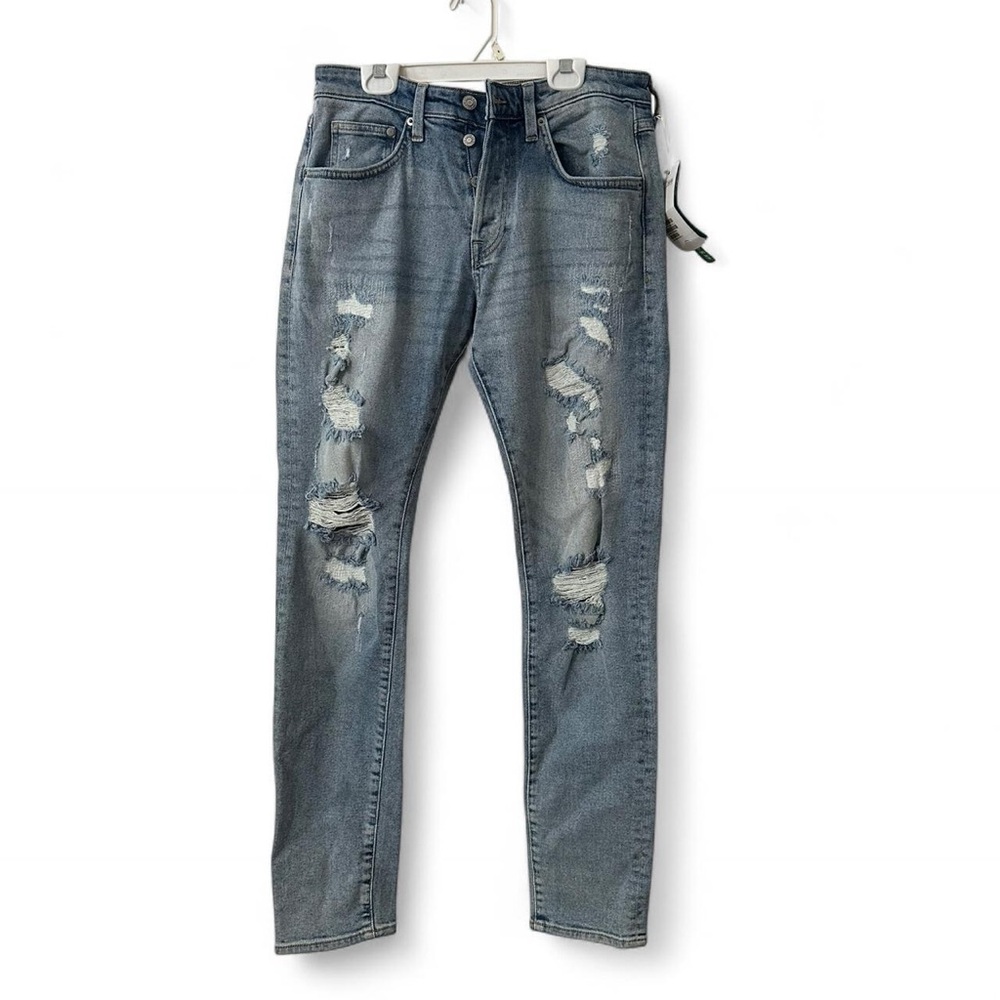 Distressed Blue Jeans